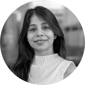 headshot of an south asian woman with long dark hair