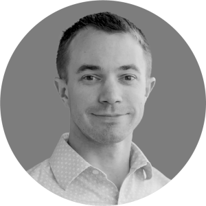 headshot of a white man with short brown hair
